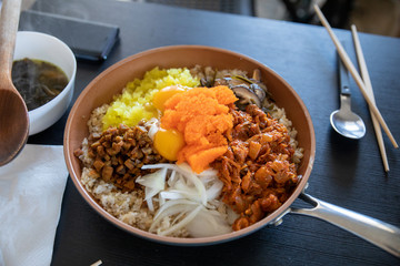 Korean rice with Tobiko egg, is orange (flying fish roe)