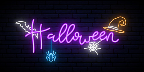 Happy Halloween neon concept banner. Bright Halloween lettering on dark brick wall background.