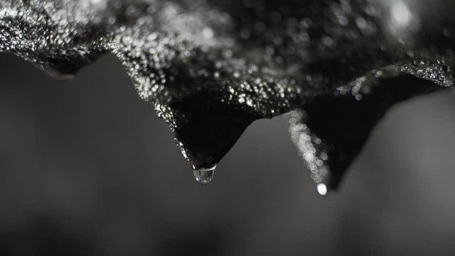 Basalt Stalactites With Water Drop