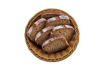 Top view of brown bread in basket isolated on white