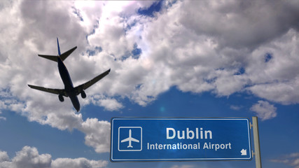 Fototapeta premium Plane landing in Dublin with signboard