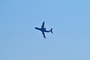 Aerobatics. Planes in the blue sky. Traces of aircraft in the sky. Drawings on the sky.