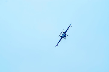 Aerobatics. Planes in the blue sky. Traces of aircraft in the sky. Drawings on the sky.