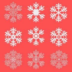 Naklejka na ściany i meble Set of snowflakes on red background