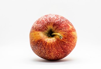 Biological red apple isolated on white background.