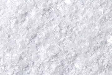 White fluffy artificial snow texture abstract background