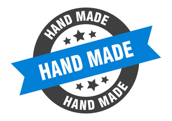 hand made sign. hand made blue-black round ribbon sticker