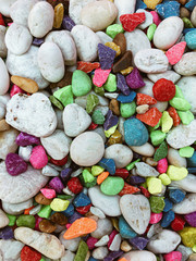 Semiprecious Colorful Polished Stone Background On Sandy Beach