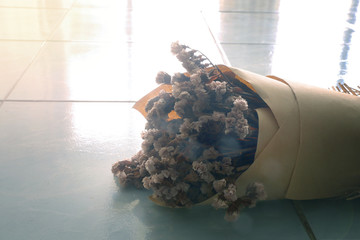 Bouquet of dried flowers on the floor,Lens Flare