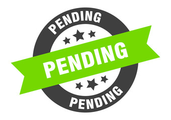 pending sign. pending black-green round ribbon sticker