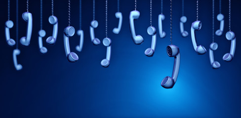 Call center and business communication concept, a lots of hanging retro telephone handsets on a blue background