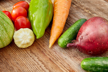 different vegetables on a wooden table