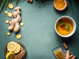 Turmeric ginger tea ingredients background. Top view. Copy space