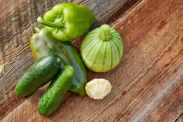 green vegetables on a wooden board. Proper nutrition for children
