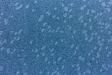 Frost auf einer Oberfläche aus Metall