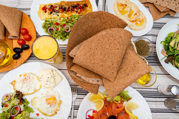 breakfast with fresh eggs and salad