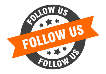 Fototapeta premium follow us sign. follow us orange-black round ribbon sticker