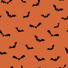 Bats seamless repeat pattern for october holidays on orange background. Vector illustration EPS10.