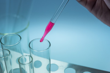 Science chemical tubes with colorful liquid. Medical laboratory research background. pharmacology and biotechnology concept. Copy space for texting.