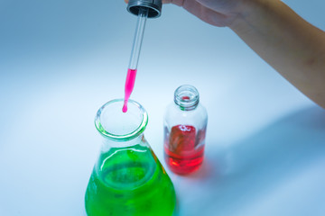 Science chemical tubes with colorful liquid. Medical laboratory research background. pharmacology and biotechnology concept. Copy space for texting.