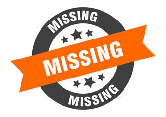 missing sign. missing orange-black round ribbon sticker