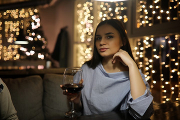 The girl in the evening rest in a cafe