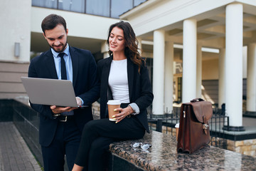 awesome couple reading news, information from the net. close up photo. technology concept, copy space
