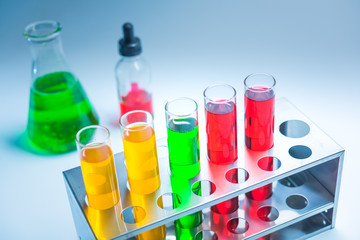 Science chemical tubes with colorful liquid. Medical laboratory research background. pharmacology and biotechnology concept. Copy space for texting.