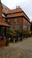 Old buildings on street, City Lubeck, Ancient Germany, background