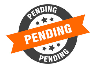 pending sign. pending orange-black round ribbon sticker