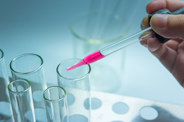 Science chemical tubes with colorful liquid. Medical laboratory research background. pharmacology and biotechnology concept. Copy space for texting.