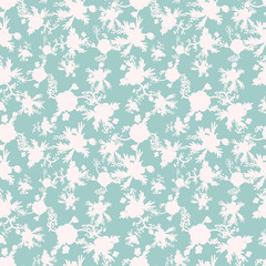 A seamless vector pattern with white floral silhouettes on a pale teal background. Surface print design.