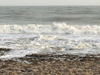 waves crashing on rocks