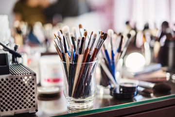 Make-up table, make-up brushes, cosmetics