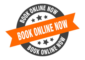 book online now sign. book online now orange-black round ribbon sticker
