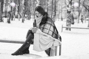 A girl in a winter cloudy day