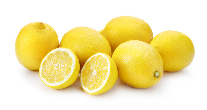 heap of fresh lemon fruits isolated on white background