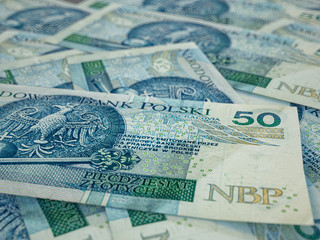 PLN. Polish zloty. Currency of Poland. Business background. Warsaw.