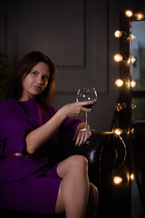 Fototapeta na wymiar woman with a glass of wine
