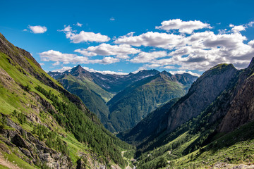Fototapeta na wymiar Colourful Landscape view of mountains peaks in the Alps . GrossVenediger, Summer in The Alps, Austria.