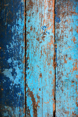 Background of old painted yellow-blue paint Board.
