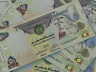 AED. Currency of  United Arab Emirates. Emirates Dirham bussiness background. Dubai, Abu-Dhabi