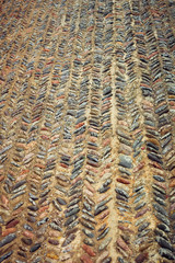 background of fine river stone, pavement lined with stone