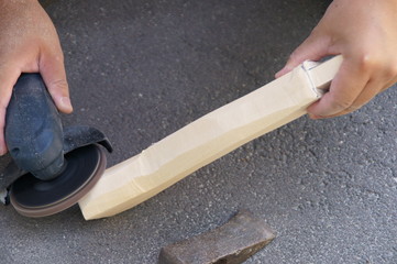 Woodworking the handle of the ax