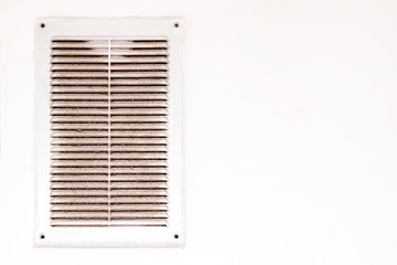 dirty grill of kitchen chimney . chimney grill cleaning concept. Background lattice of an exhaust hood.