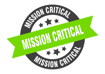 mission critical sign. mission critical black-green round ribbon sticker