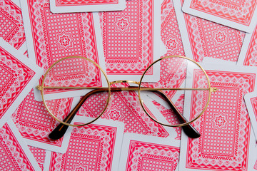  Glasses on spread of cards