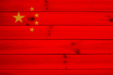 photo of the national flag of China on a luxurious texture, closeup, copy space, concept of travel,...