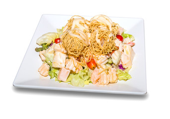 nodle mixed with vegetable salad on whit dish