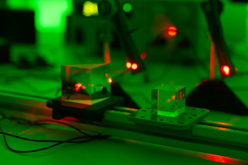 Experiment with a red laser in a physics lab